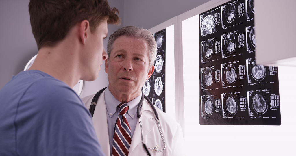 Patient examining his x-rays. TryMunity.